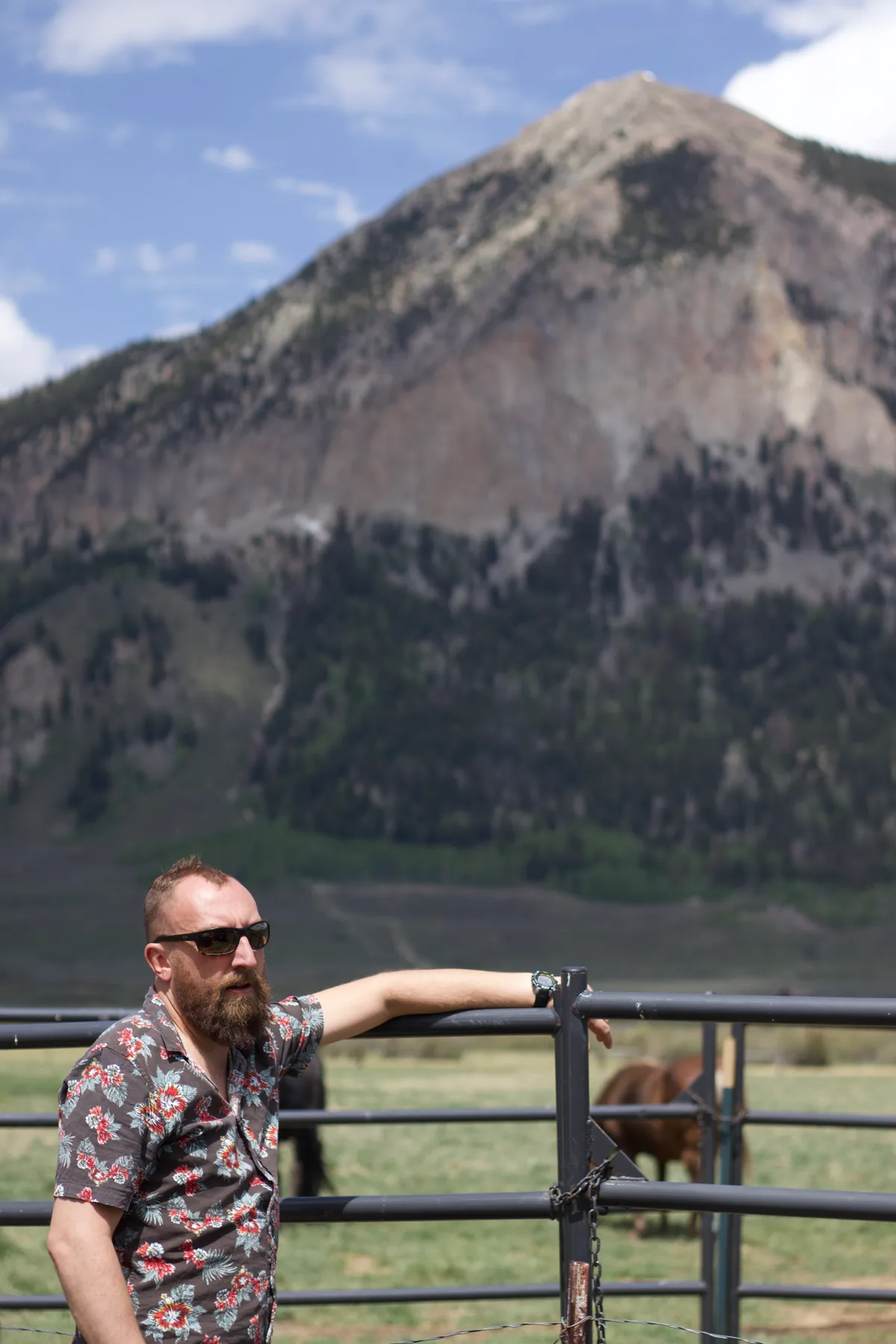 Aaron Hutten outdoors in front of a mountain